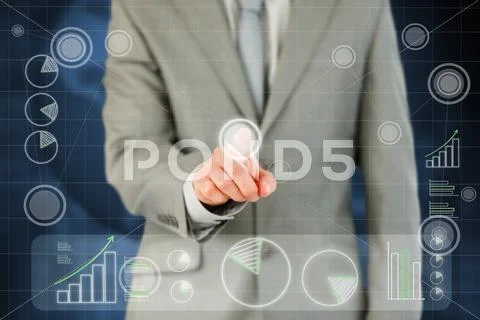 Businessman's finger activating futuristic touchscreen Stock Photos