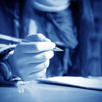 Businessman's hand with pen Stock Photos