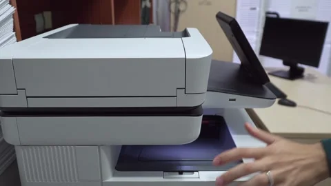 Businessman's hands working in the office, making photocopies Stock Footage 274447718