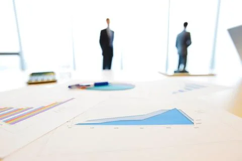 Businessmen and documents Stock Photos