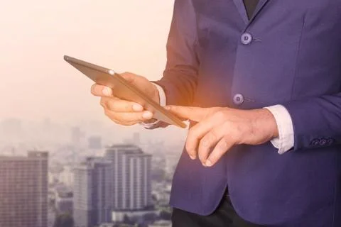 Businessmen are using tablets. Stock Photos