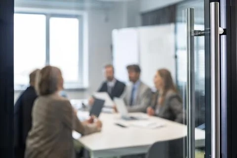 Businessmen blur in the workplace in office with computer or shallow depth .. Stock Photos