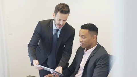 Businessmen collaborating Stock Footage 75794427