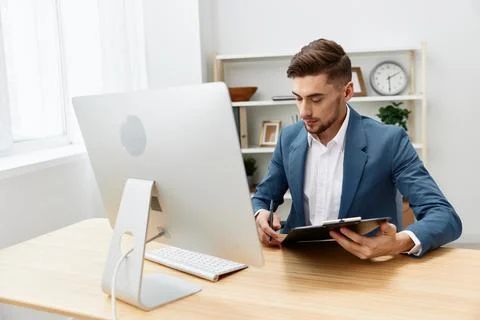 Businessmen computer desktop work self-confidence paper folder Gray background Stock Photos