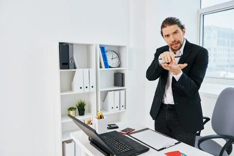 Businessmen at the desk documents technology Stock Photos