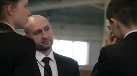 Businessmen discussing something Stock Footage 64044562