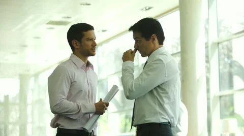 Businessmen discussing work Stock Footage 63299023