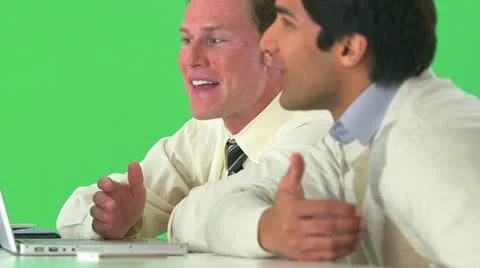 Businessmen happily working on greenscreen Stock Footage