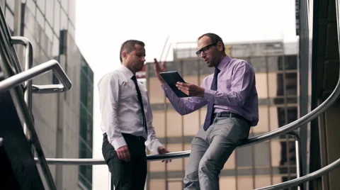 Businessmen having quarrel and using tablet Stock-Footage 44211910