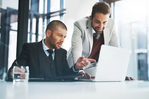 Businessmen, laptop and problem solving for discussion in office, accounting Foto stock