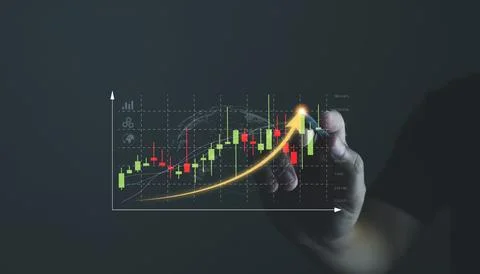 Businessmen open the graph plotting strategies to invest in the stock marke.. Stock Photos