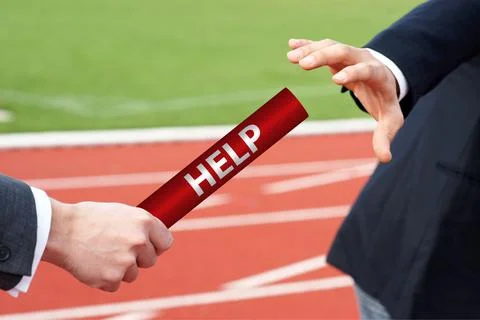 Businessmen pass help assistance baton in relay race in stadium Stock Photos