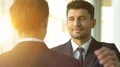 The businessmen pat on the shoulder. slow motion 4k or 4k+ Resolution
