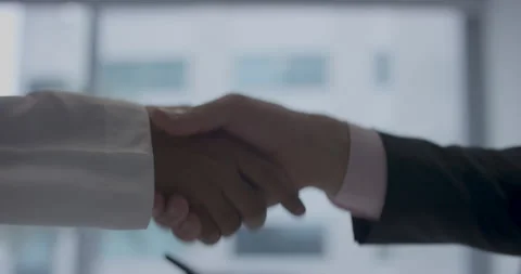 Businessmen shaking hands. Stock Footage 247115691