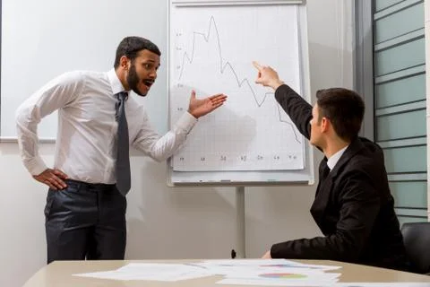 Businessmen solve a problem. 写真素材