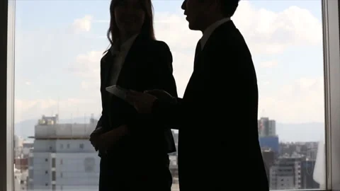 Businessmen talk while walking Stock Footage 161930941
