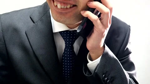 Businessmen talking on the phone Stock Footage 336422255