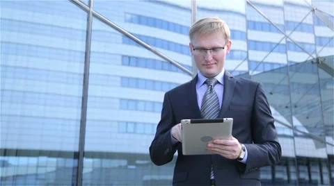 Businessmen using digital tablet computer touchscreen Stock Footage 68055535