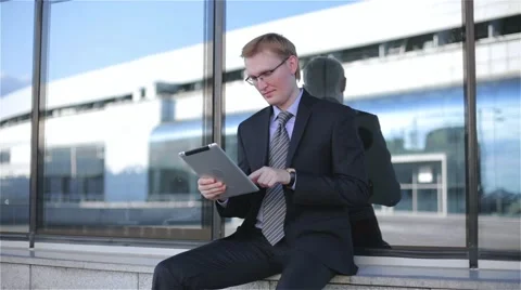 Businessmen using digital tablet computer touchscreen Stock Footage 68056259