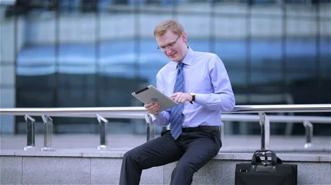 Businessmen using digital tablet computer touchscreen 動画素材 68056624