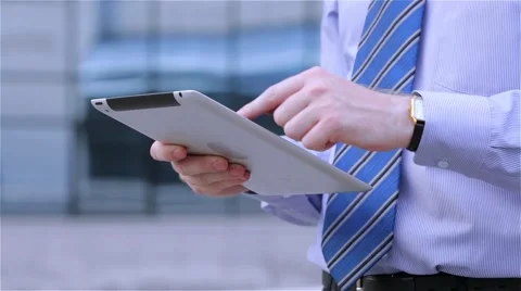 Businessmen using digital tablet computer touchscreen (close-up) Stock Footage 68056740