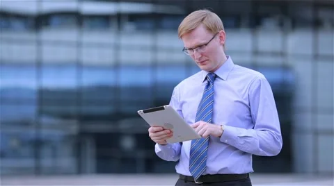 Businessmen using digital tablet computer touchscreen 動画素材 68056749