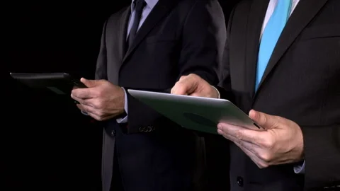 Businessmen using tablet Stock-Footage 210165808