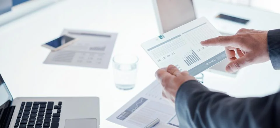 Businessmen using a touch screen device Stock Photos
