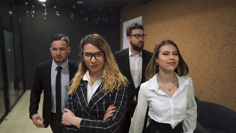 Businessmen Walking Down the Hall Stock Footage 107347049