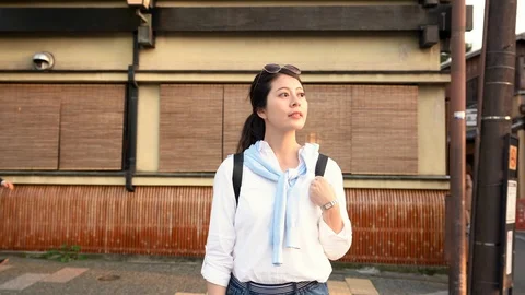 Businessmen walking by is looking at her Stock-Footage 97626903