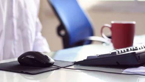 Businessmen working in the office, using computer searches new job on interne Stock Footage 114900613