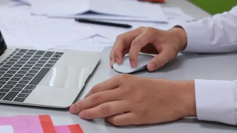 Businessmen working in the office, using computer searches new job on interne Stock Footage 114900617