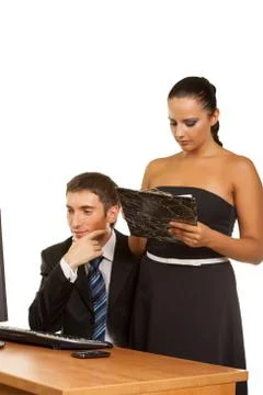 Businesspeople discussing while working at the computer 스톡 사진