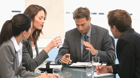 Businesspeople having a discussion during a meeting Stock Footage
