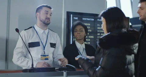 Businesspeople having visa denial problem in airport Stock Footage 87183519