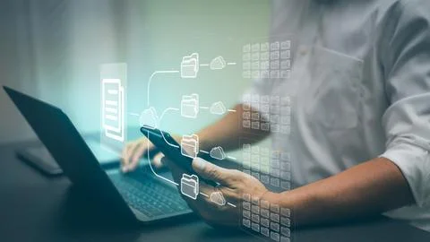 Businesspeople manage corporate document databases through the cloud, cyber.. 스톡 사진