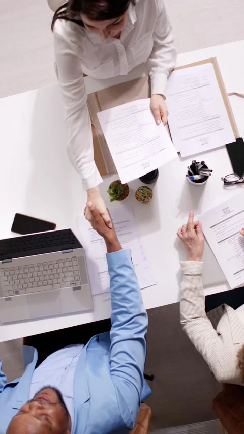 Businesspeople Shaking Hands After Interview Stock Footage 240853311