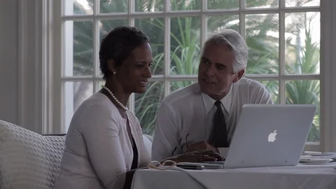 Businesspeople using a laptop. Stock Footage 88369288