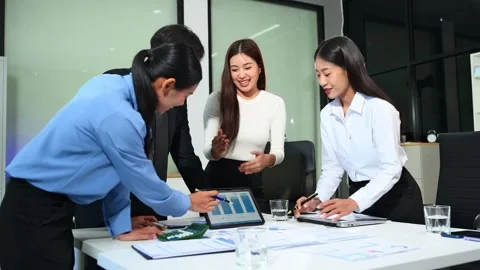 Businesspeople while collaborating on a new project in an office. Group of .. Video stock 313857938