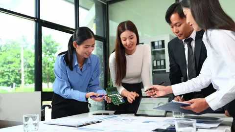 Businesspeople while collaborating on a new project in an office. Group of .. Video stock 313857996