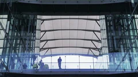 Businesspeople at window of skyscraper Stock Footage 27762982