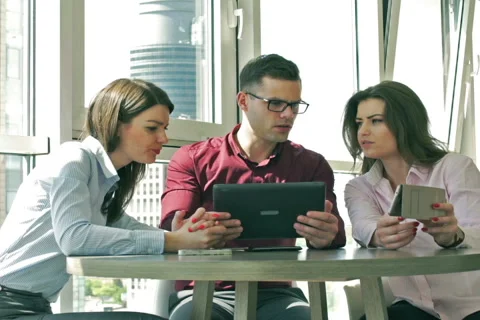 Businesspeople working on electronics in the office Stock-Footage 50569670