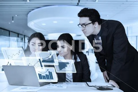 Businesspeople working with virtual chart Stock Photos