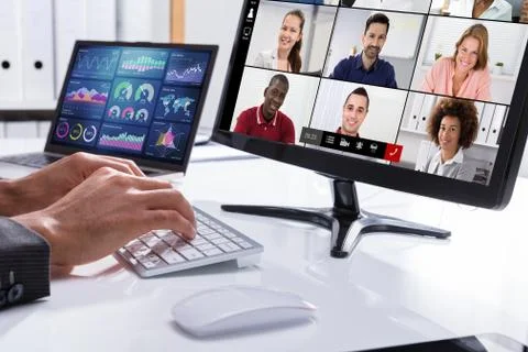 Businessperson Checking Invoice On Computer 스톡 사진