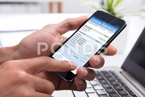 Businessperson Doing Online Banking On Smartphone Stock Photos