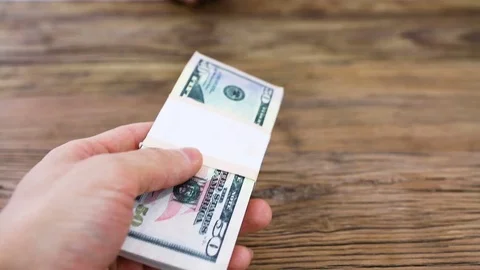 Businessperson Refusing Bribe Given By A Person At Desk Stock Footage 75547225