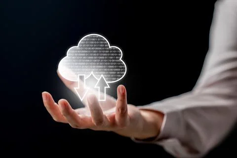 Businessperson showing a cloud computing icon on his hand. Technology innov.. Foto stock