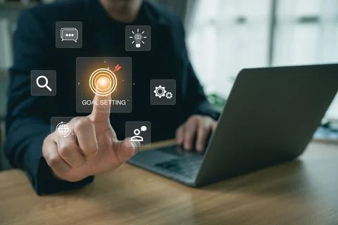 Businessperson Using Digital Touchscreen Interface to Set Goals and Plan St.. Stock Photos