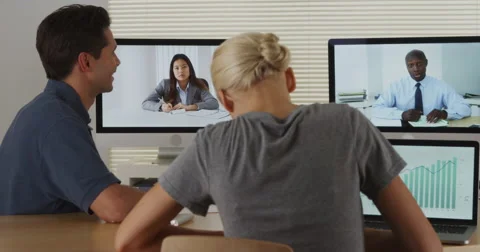 Businessteam sharing thoughts over the internet Video stock 42693528
