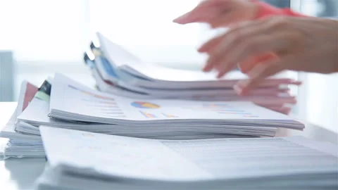 Businesswoman Accountant Sorting  Stack Of Documents Video stock 172302629